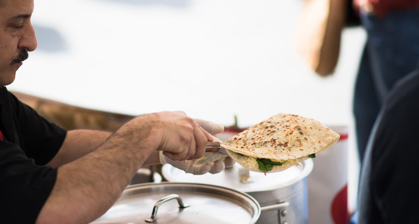 Man eating gozleme